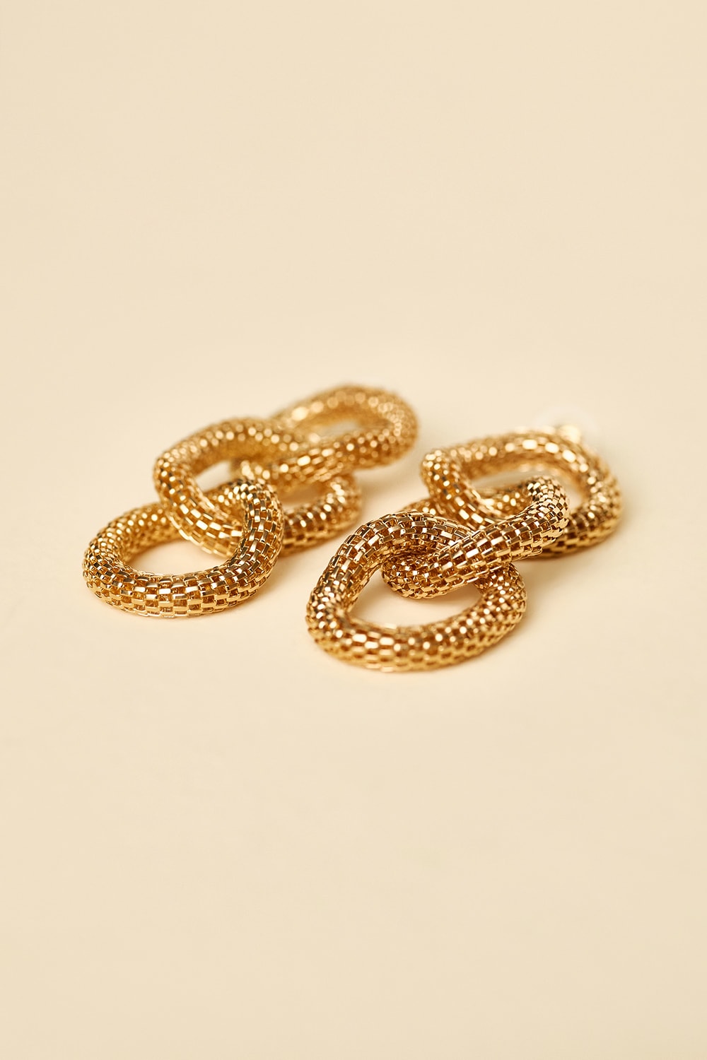 Brinco dani Dourado
