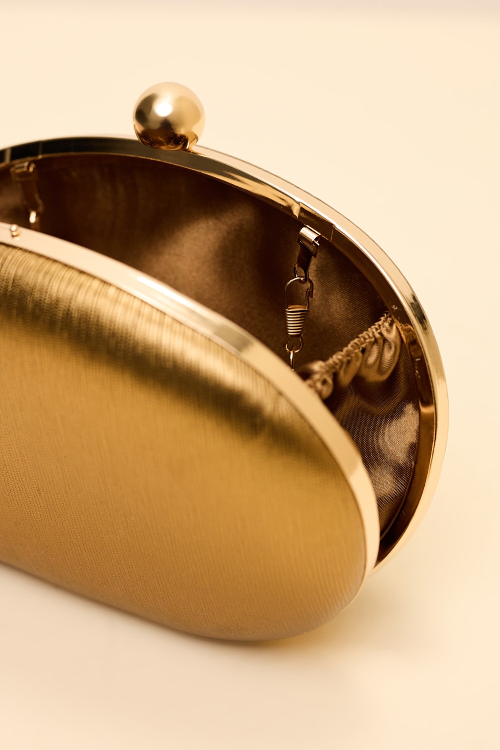 Clutch vivienne Bronze